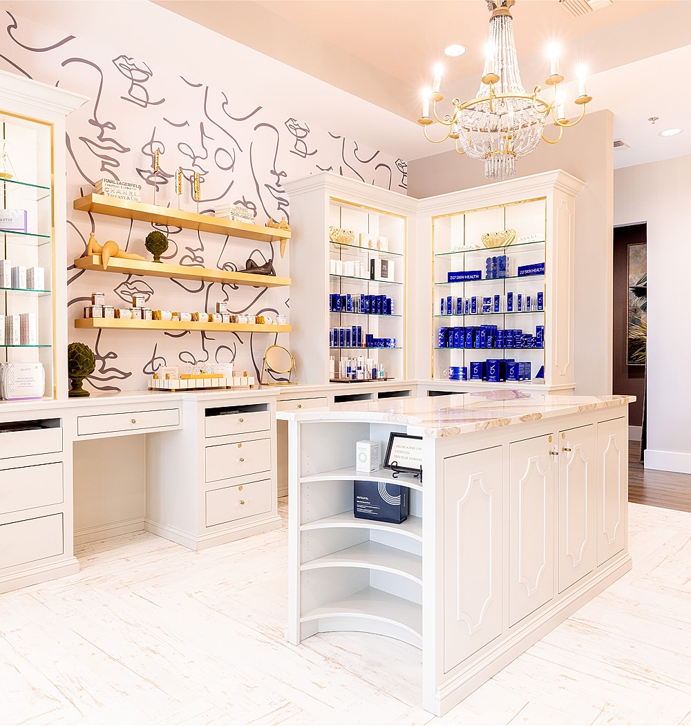 Elegant spa interior with skincare products displayed.