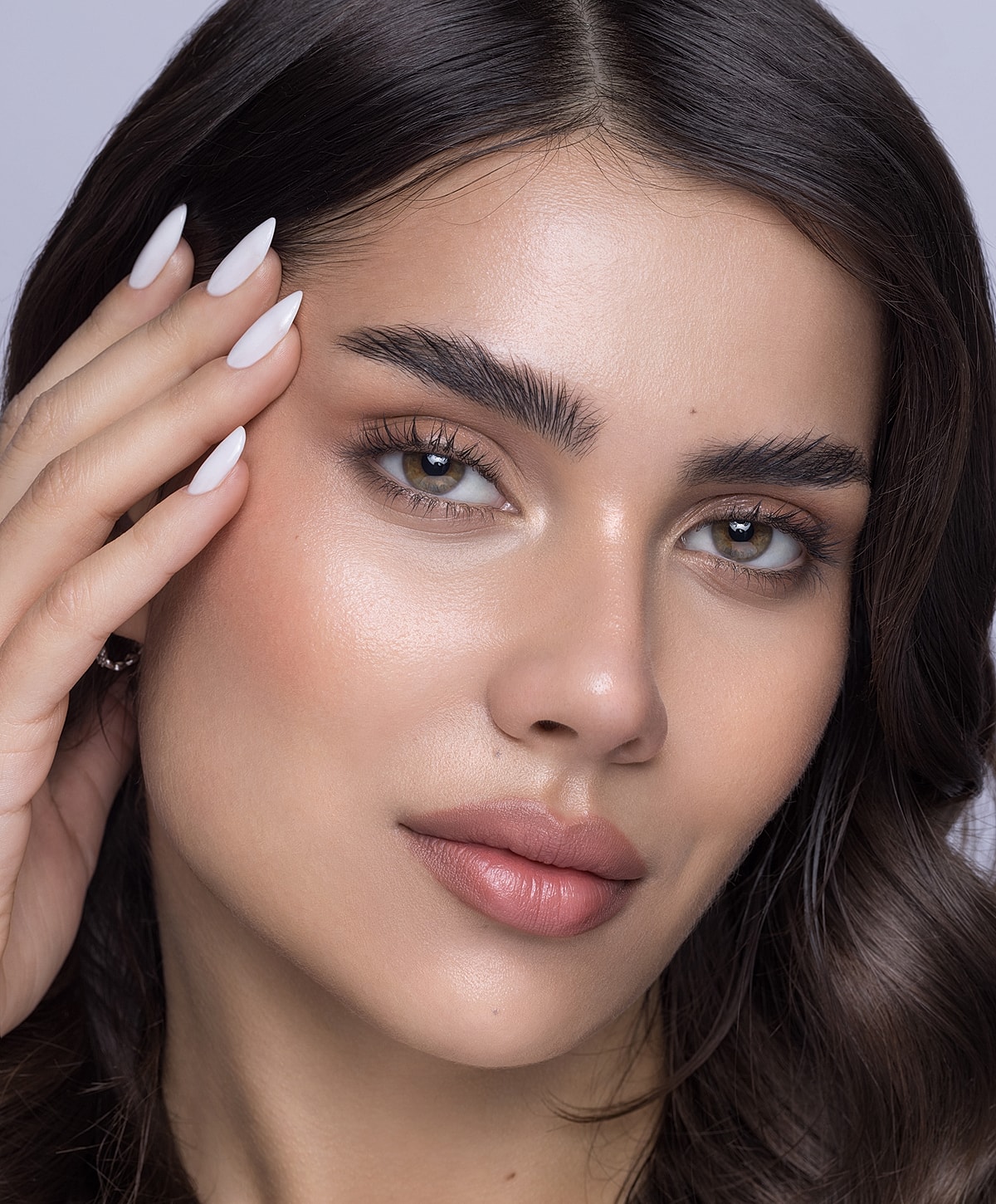 Close-up portrait of a Lafayette blepharoplasty model with flawless skin.