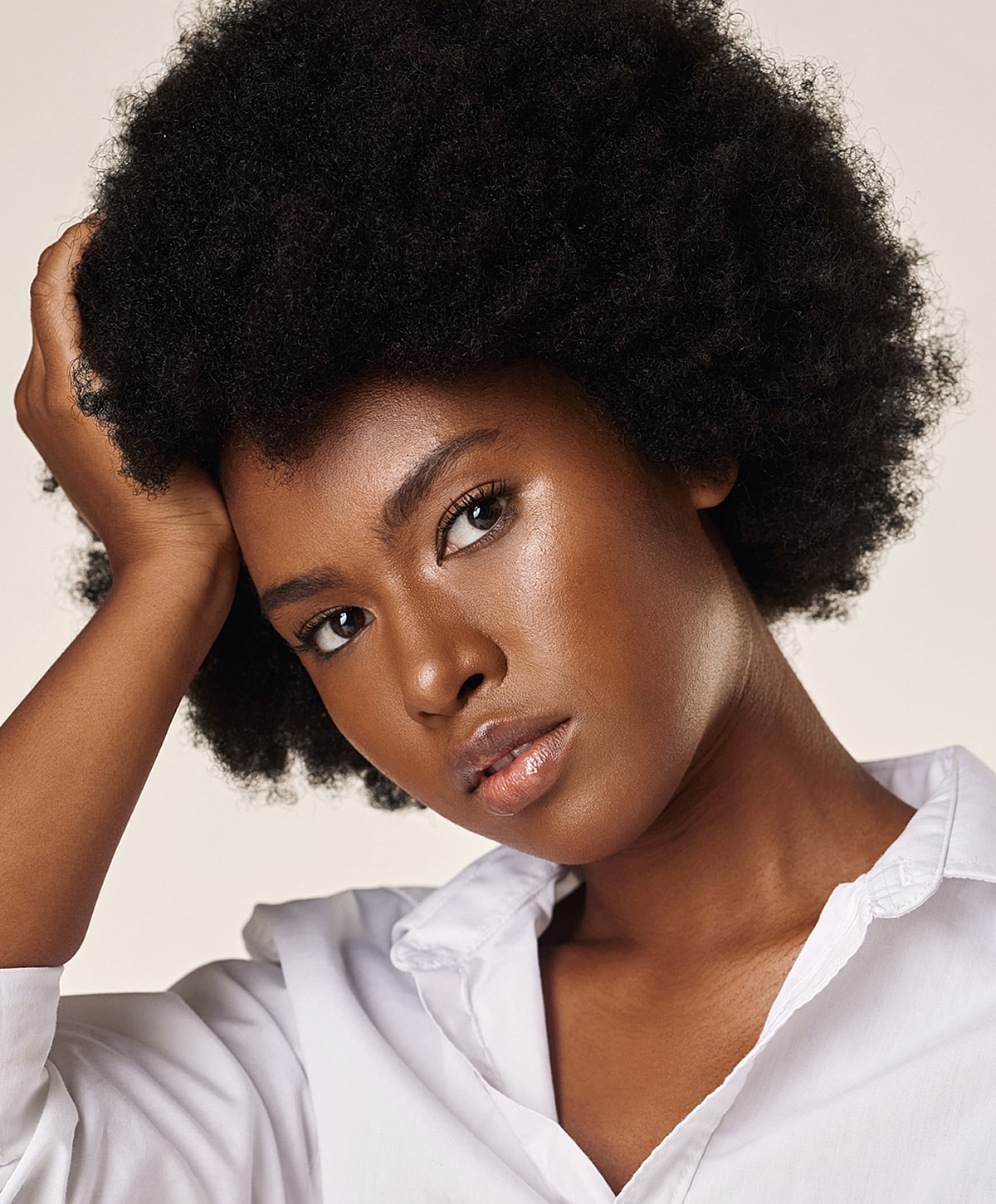 Portrait of a woman with textured hair.