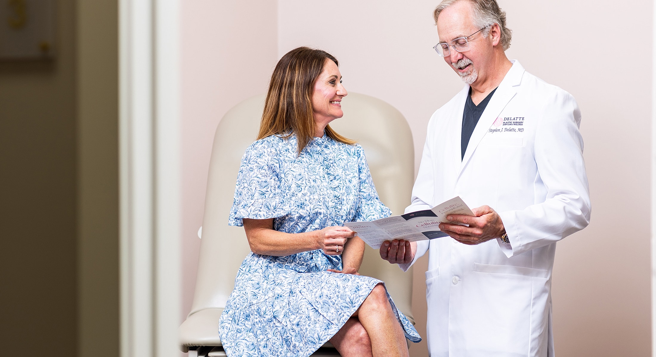 Doctor consulting with patient in medical office.